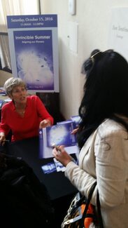 Dr Ann Polya signing books